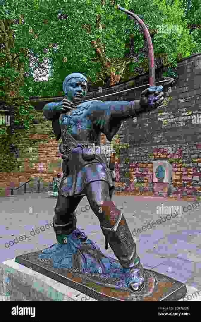 A Majestic Statue Of Robin Hood, Bow In Hand, Standing Tall In A Clearing In The Forest Of Arden Lost John: A Young Outlaw In The Forest Of Arden
