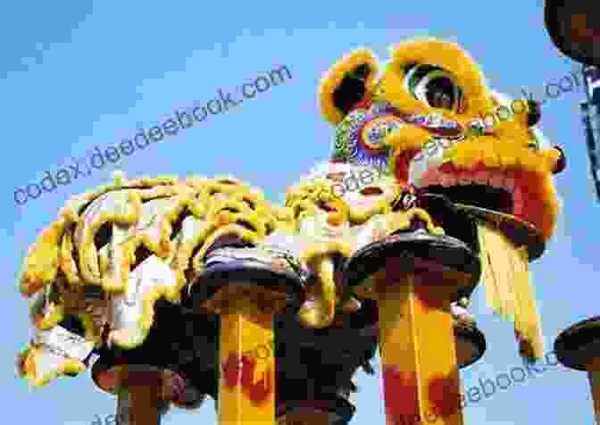 A Photograph Of A Vibrant Lion Dance Performance, With Two Lions Leaping And Dancing In Unison. Lion Dance: An Ancient Chinese Tradition