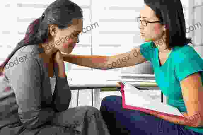 A Therapist And Client Engaged In A Conversation During A Therapy Session Developmental Couple Therapy For Complex Trauma: A Manual For Therapists